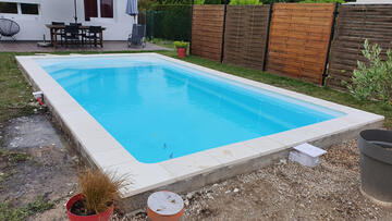 Pose de piscine à coque